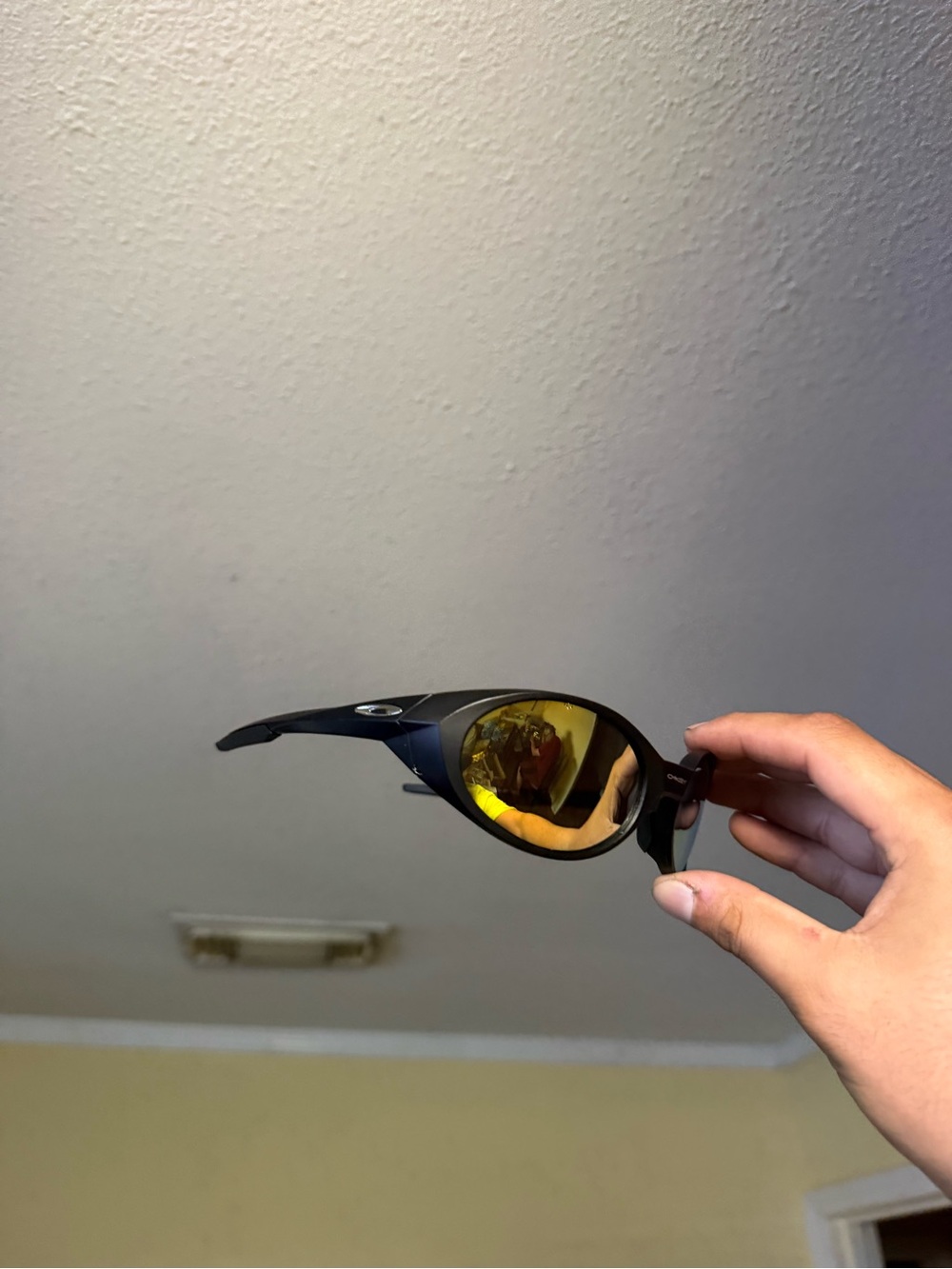 Oakley Black Sunglasses with Yellow Mirrored Lenses